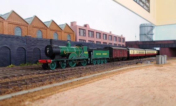 T9 no.30119 hauls Mk1 set 876 on an Up Waterloo service; this set being released new from Eastleigh Works on 1st June 1952 in Crimson Lake & Cream livery.