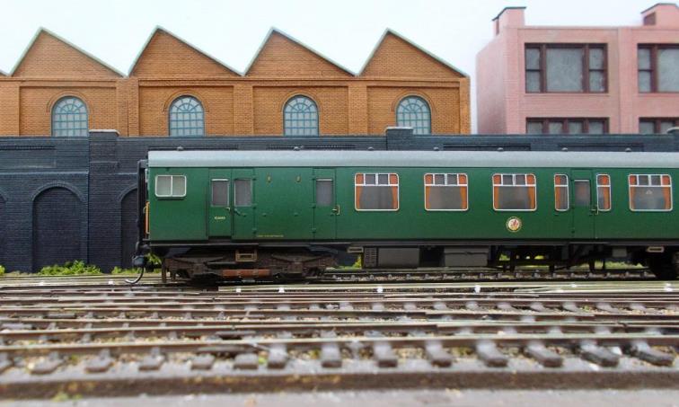 An unidentified 4 CEP unit undertakes conductor-rail clearance testing on a newly laid section of con-rail. Soon after this photograph was taken the section of con-rail was lifted, primed, painted and re-laid back in place.