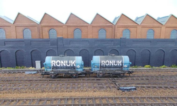 Ronuk of Portslade produced polish and had a fleet of two tanker wagons, these were expertly weathered by TMC from an original photograph. 
Ronuk appeared to have two 3,500 gallons railway tankers numbered 34 & 38; these carried white spirit between Esso at Fawley and Portslade. Producing polish, Portslade’s Ronuk factory was established in 1902 & rail-served from c.1920; the name Ronuk being an Anglicised form of ronak (Kurdish clear ) /ronaq (Urdu lustre ) /raunaq (Persian). In the late 1950’s Newton, Chambers & Co. acquired Ronuk, the Portslade factory was closed and production moved to Sheffield. However, the Ronuk-company brand-names Colton & Ronseal still survive.
www.EwhurstGreen.com 

