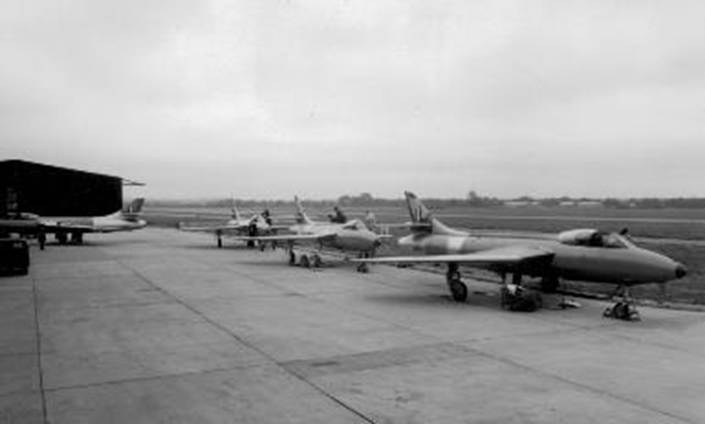 A group of airplanes on a runway
Description automatically generated with low confidence